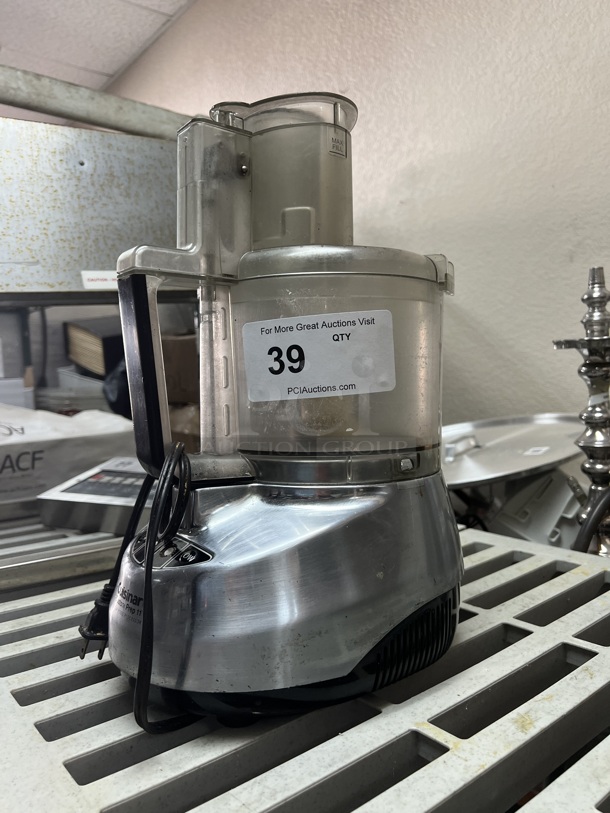 Cuisinart PREP 11 PLUS™ 11 CUP FOOD PROCESSOR The Cuisinart® Prep 11 Plus™ 11 Cup Food Processor boasts a revolutionary motor with alternate speeds for perfect mixing, and features Cuisinart®'s patent-pending Dough Control technology, which adjusts the speed to automatically ensure proper dough consistency. The Prep 11 Plus™ includes a rounded housing for easier cleaning and handling, new safety features, and the Supreme™ Wide Mouth Feed Tube. Plus, it's backed by a ten-year warranty, the longest in the industry!  115 Volt     Tested and working! - Image 2 of 2