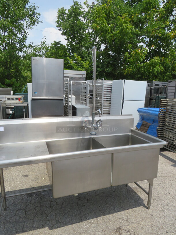 One Stainless Steel 2 Compartment Sink With Left Drain Board, Back Splash And Faucet With Hose Sprayer. 73.5X28.5X42.5. Sink 24X24X15. - Image 2 of 2