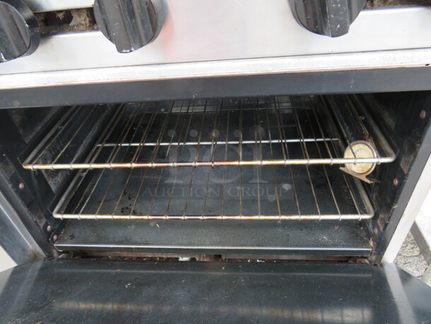 One Natural Gas American Range 6 Burner With Over Shelf, And 2 Racks, On Casters. 36X32X57 - Image 2 of 2