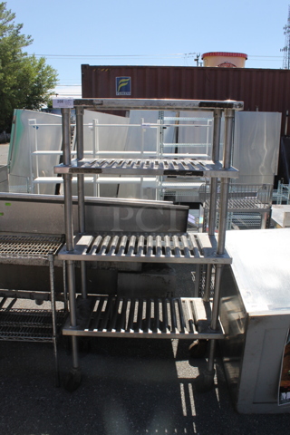 Metal 4 Tier Shelving Unit on Commercial Casters. BUYER MUST DISMANTLE. PCI CANNOT DISMANTLE FOR SHIPPING. PLEASE CONSIDER FREIGHT CHARGES.