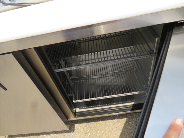 One True 2 Door Refrigerated Prep Table With Cutting Board, And 4 Racks On Casters. 115 Volt. Model# TSSU-48-12-HC. 48X30X43. $3825.00 - Image 3 of 3