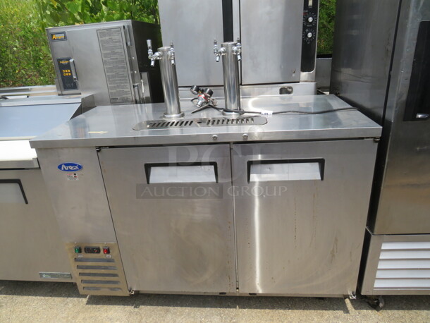 One Stainless Steel Atosa 2 Door Keg Box With 2 Towers And 4 Taps, On Casters. Model# MKC58GR. 115 Volt. 58X27X40. $2812.00. - Image 1 of 2