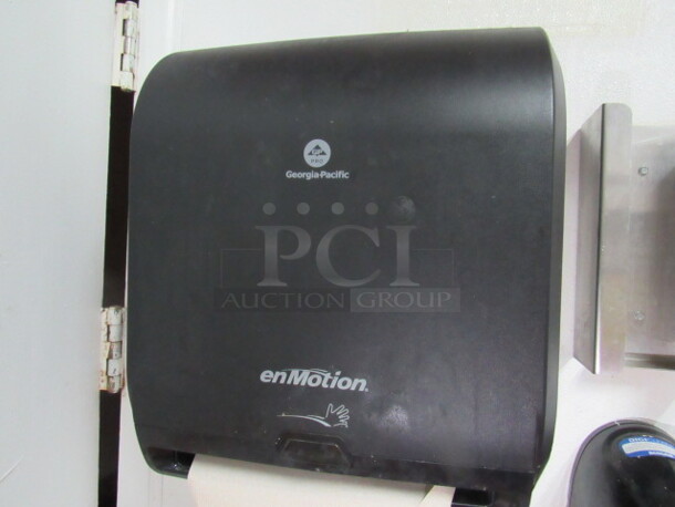 One Wall Mount En Motion Automatic Touch Free Paper Towel Dispenser. BUYER MUST REMOVE!