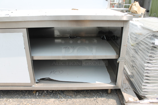 BRAND NEW SCRATCH AND DENT! Stainless Steel Commercial Table w/ Back Splash and 2 Doors.  - Image 4 of 5
