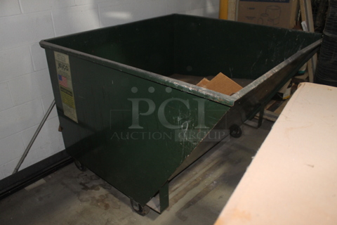 Green Metal Dumpster on Commercial Casters.