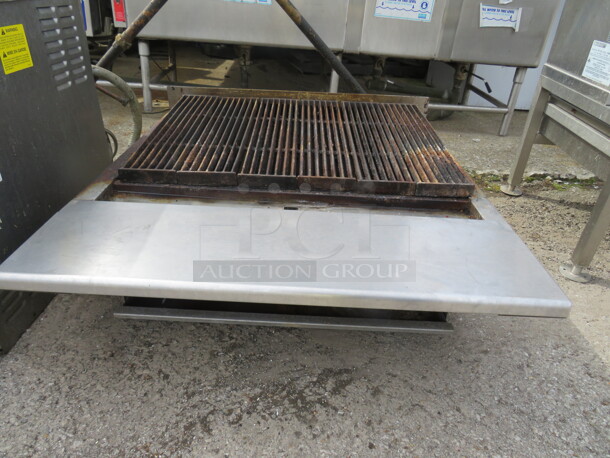 One WORKING Vulcan Natural Gas Charbroiler. 36X40X15