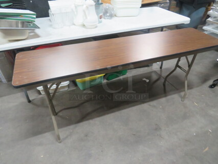 One 72X18X29 Folding Table. 