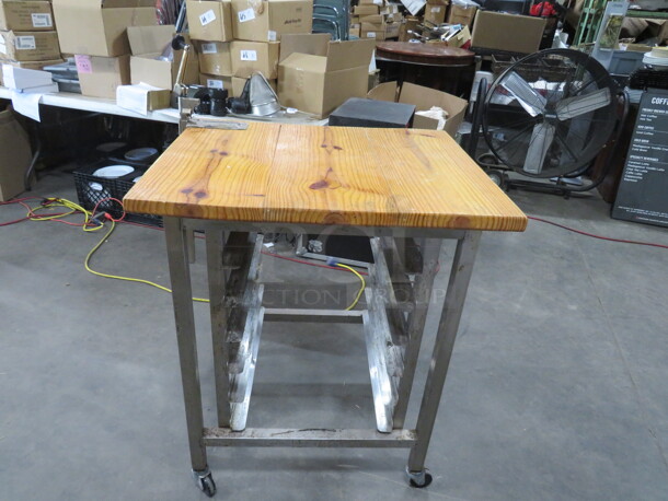One Speed Rack With Custom Made Butcher Block Top With A 10lb Can Opener, On Casters. 27.5X35X38.5