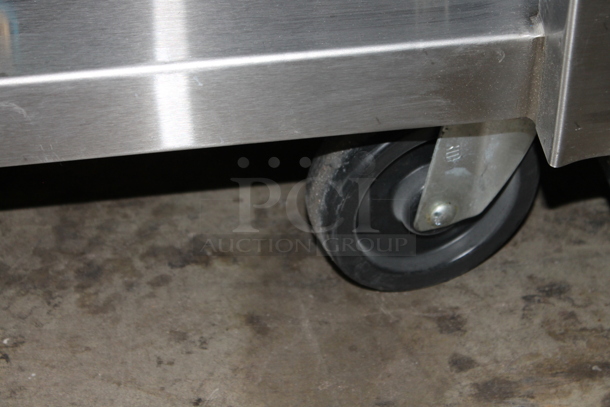 BRAND NEW! Jade Range JTRH-60B Stainless Steel Commercial Natural Gas Powered Charbroiler Grill w/ Under Shelf and 5 Gas Hoses on Commercial Casters.  - Image 7 of 8