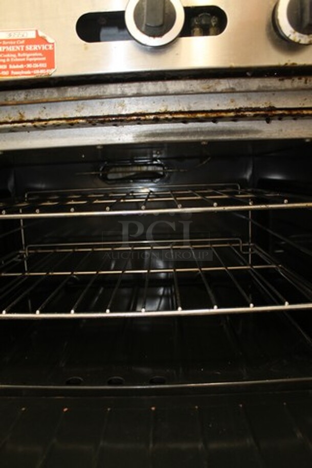 Garland PS-24G-6-2628 Stainless Steel Commercial Natural Gas Powered 6 Burner Range w/ Left Side Flat Top Griddle, 2 Ovens, Over Shelf and Back Splash. - Image 6 of 7