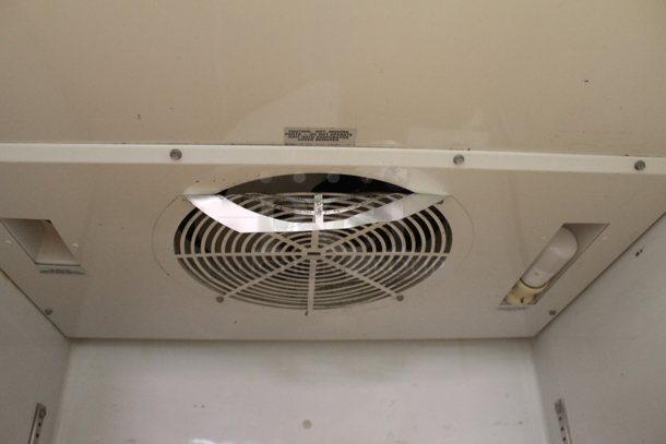 2015 True TG1R-1S ENERGY STAR Stainless Steel Commercial Single Door Reach In Cooler w/ Poly Coated Racks on Commercial Casters. 115 Volts, 1 Phase. Tested and Working! - Image 7 of 10