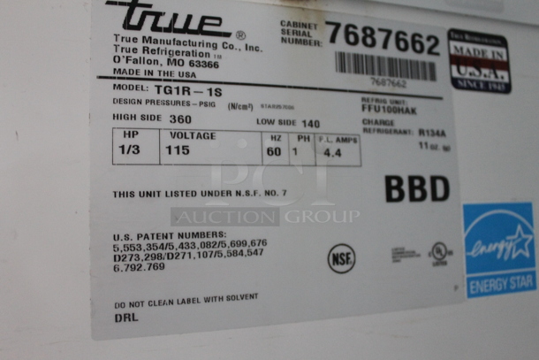 2013 True TG1R-1S ENERGY STAR Stainless Steel Commercial Single Door Reach In Cooler w/ Poly Coated Racks on Commercial Casters. 115 Volts, 1 Phase. Tested and Working! - Image 7 of 7