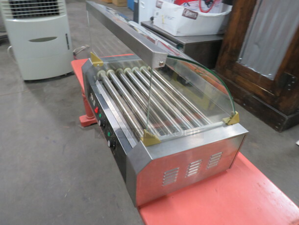 One WORKING CW Hot Dog Roller With Sneeze Guard. Model# 
EP19235. 110 Volt.  - Image 2 of 3