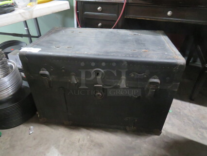 One VINTAGE Steamer Trunk. 34X20.5X23