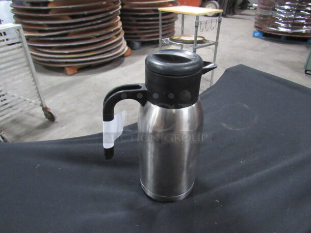 One Thermos Stainless Steel Creamer.