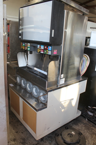 Lancer Stainless Steel Commercial 16 Flavor Carbonated Beverage Machine on Soda Station.
