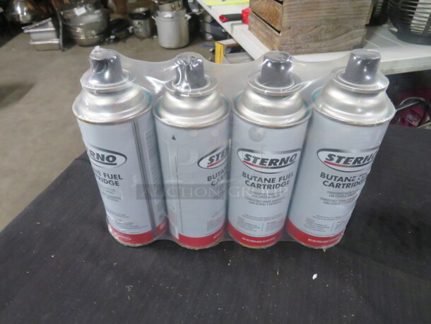 One Lot Of 4 NEW Butane Fuel.