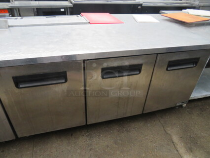 One 3 Door Blue Air Under Counter Refrigerator With 3 Racks On Casters. 115 Volt. Model# BAUR72. 72.5X30X36