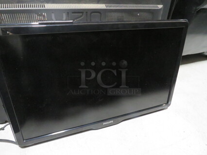 One Phillips 32 Inch TV. Model#32PFL6704D/F7