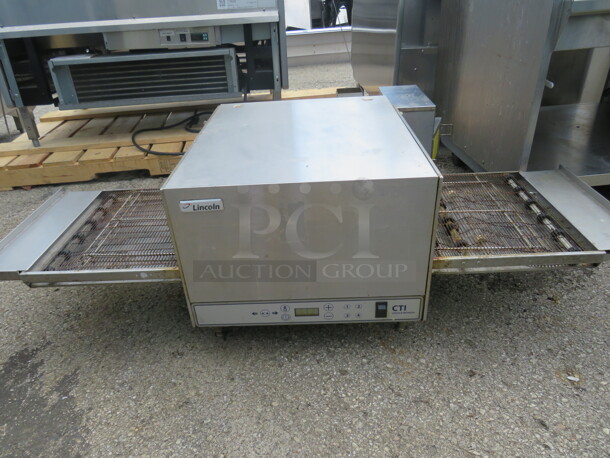 One Lincoln Impinger CTI Tabletop Conveyor Pizza Oven. Model# 2501003U0201520. 208 Volt. 1 Phase. 58X31X18