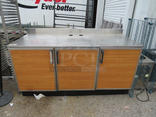 One 3 Door Cabinet With A Stainless Steel Top. 72X29.5X42 - Image 1 of 1