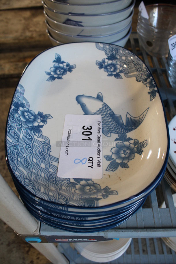 8 White and Blue Ceramic Plates. 12x8x1.5. 8 Times Your Bid!
