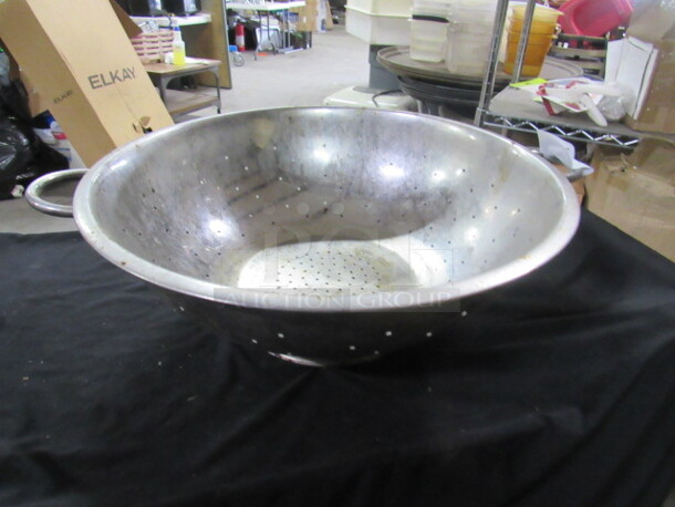 One 16 Inch Stainless Steel Colander.