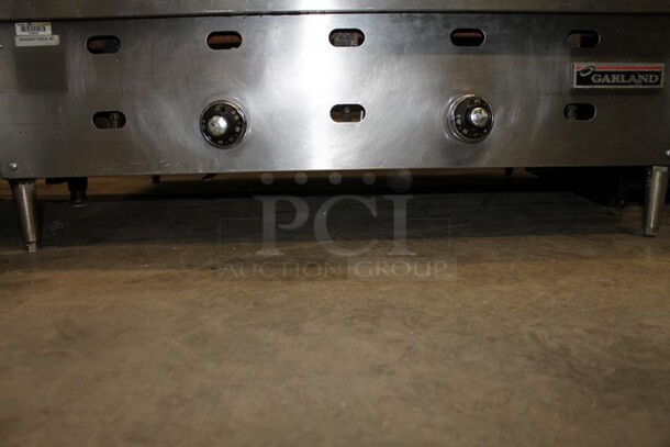 Garland Stainless Steel Commercial Countertop Natural Gas Powered Flat Top Griddle.  - Image 2 of 3