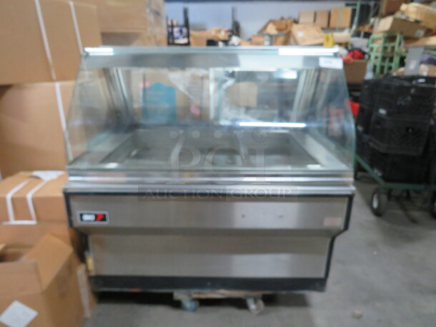 One BKI 3 Well Steam Serve Table  Curve Glass Display. 208 Volt. 3 Phase. #WDC-3. 49X37X48.