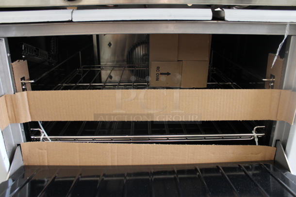BRAND NEW SCRATCH AND DENT! LATE MODEL! Garland Stainless Steel Commercial Natural Gas Powered 6 Burner Range w/ Convection Oven, Over Shelf and Back Splash.  - Image 5 of 8