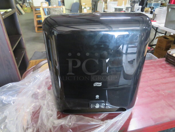 One NEW Torkmatic Automatic Hands Free Paper Towel Dispenser.  - Image 1 of 2