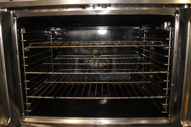Stainless Steel Commercial Natural Gas Powered Full Size Convection Oven w/ View Through Doors, Metal Oven Racks, Thermostatic Controls and Metal Legs on Commercial Casters. - Image 5 of 8