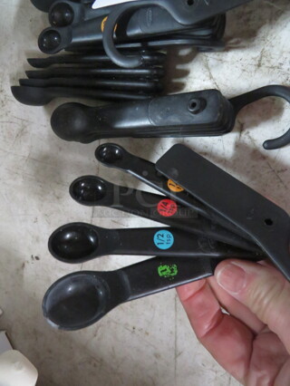 One Lot Of Assorted Poly Measurers.