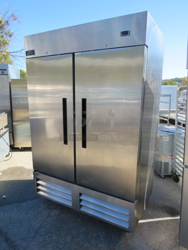 One Artic Air 2 Door Freezer With 4 Racks On Casters. Model# AF49X.  53.5X33X83. $3545.00. - Image 1 of 4
