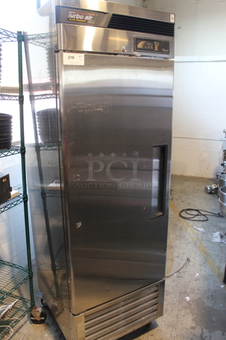 Turbo Air TSR-23SD Stainless Steel Commercial Single Door Reach In Cooler w/ Poly Coated Racks on Commercial Casters. 110-120 Volts, 1 Phase. Tested and Powers On But Does Not Get Cold