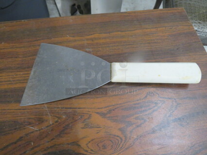 One Dexter Scraper.