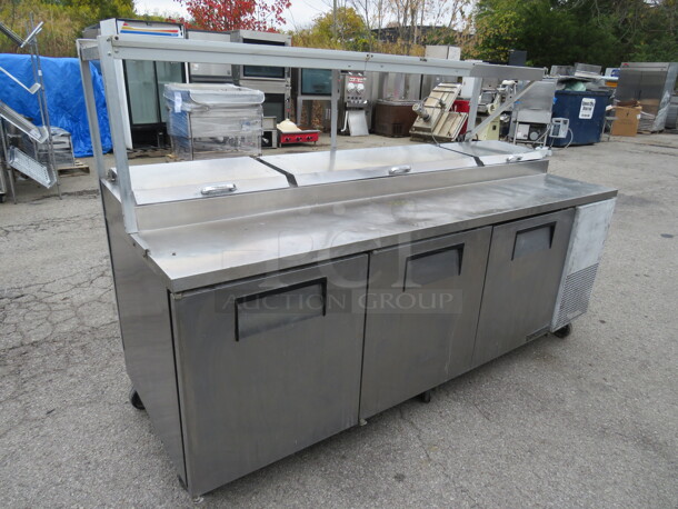 One True 3 Door Prep Table With Over shelf And 2 Ticket Rails, 2 Racks, On Casters. Model# TPP-93. 115 Volt. 93X33X59.5. Not Working - Image 3 of 4