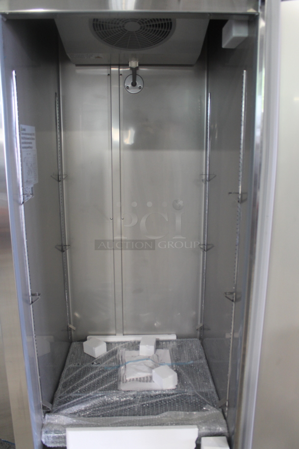BRAND NEW SCRATCH AND DENT! 2023 KoolMore RIF-1D-SS Stainless Steel Commercial Single Door Reach In Freezer w/ Poly Coated Racks on Commercial Casters. 115 Volts, 1 Phase. Tested and Working! - Image 3 of 7