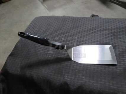 One NEW Vollrath Hamburger Turner. #4808720. 