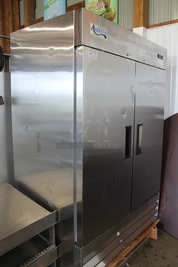 BRAND NEW SCRATCH AND DENT! Avantco 178A49RHC Stainless Steel Commercial  Two Door Reach In Cooler w/ Poly Coated Racks. 115 Volts, 1 Phase. Tested and Working! - Image 2 of 10