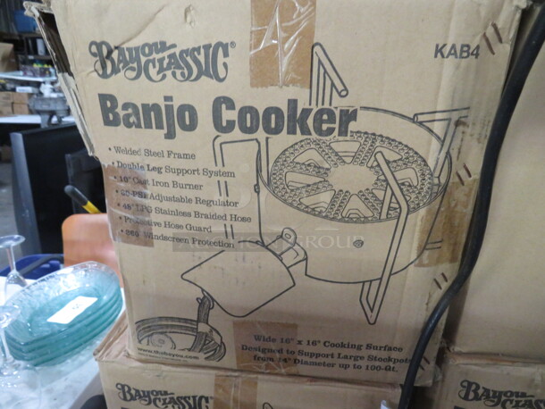 One Bayou Classic 16 Inch Banjo Propane Cooker. Model# KAB4.  - Image 2 of 3