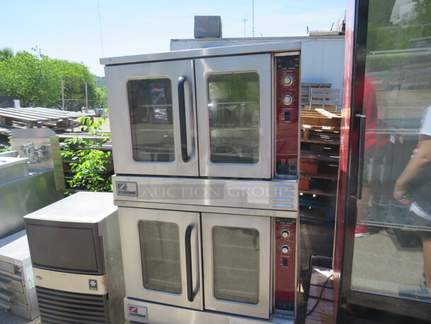 One Southbend Natural Gas Double Oven With 6 Racks. 38X39X59