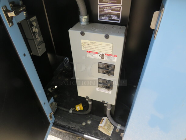 One Stainless Steel Corsair Display On Casters With Under Storage, Hand Sink, And Electrical Outlets.  - Image 7 of 7