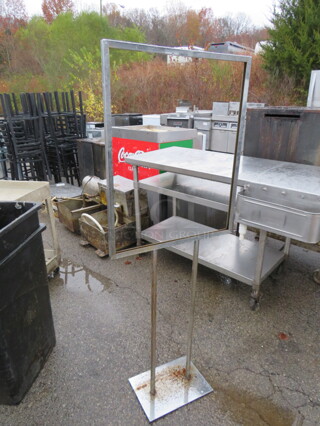 One Silver Metal Floor Sign.