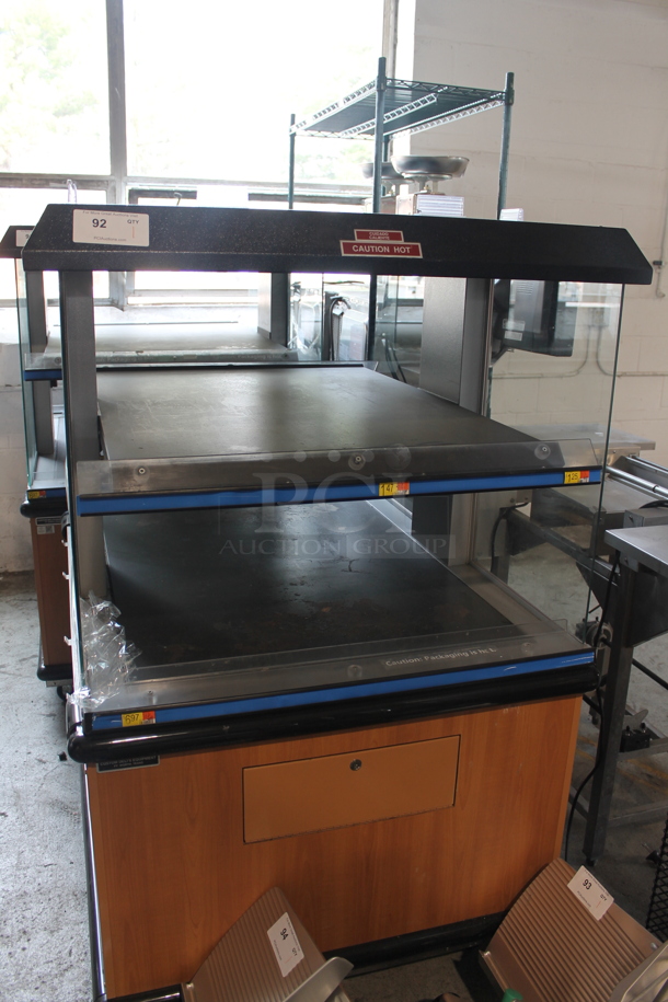 Metal Commercial Floor Style Electric Powered Heated 2 Tier Merchandiser on Commercial Casters. - Image 2 of 7