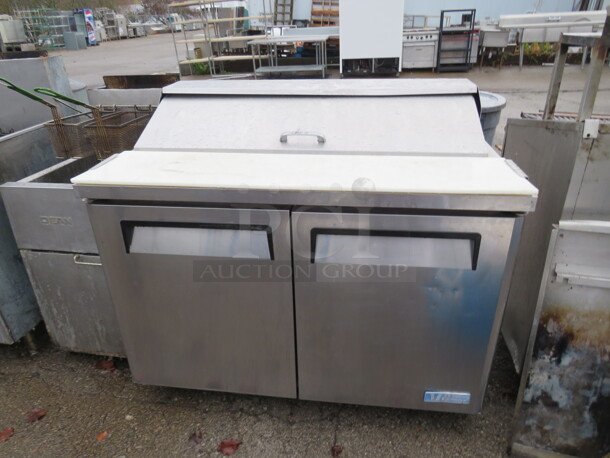 One Turbo Air 2 Door Refrigerated Prep Table With 2 Racks, And Cutting Board, On Casters. 115 Volt. Model#M3. 48X31X43 - Image 1 of 2