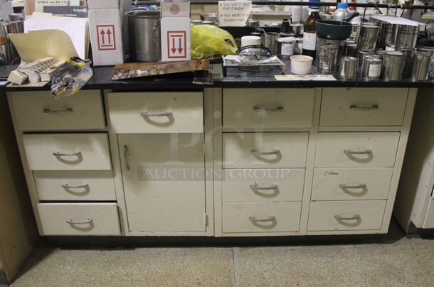 White Counter w/ Black Countertop, Doors, Drawers and Contents. BUYER MUST REMOVE. - Image 1 of 8