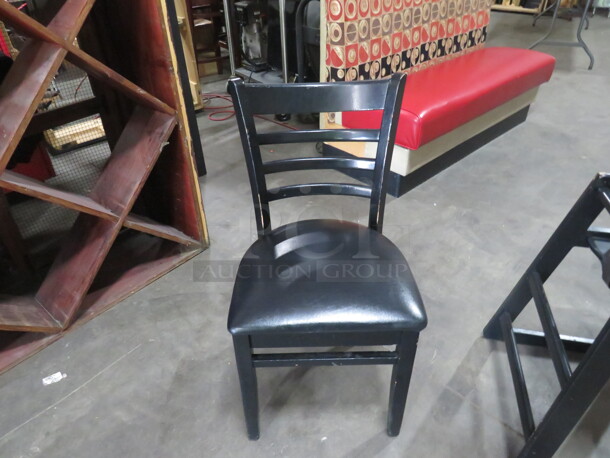 Black Wooden Chair With Cushioned Seat. 2XBID - Image 1 of 1