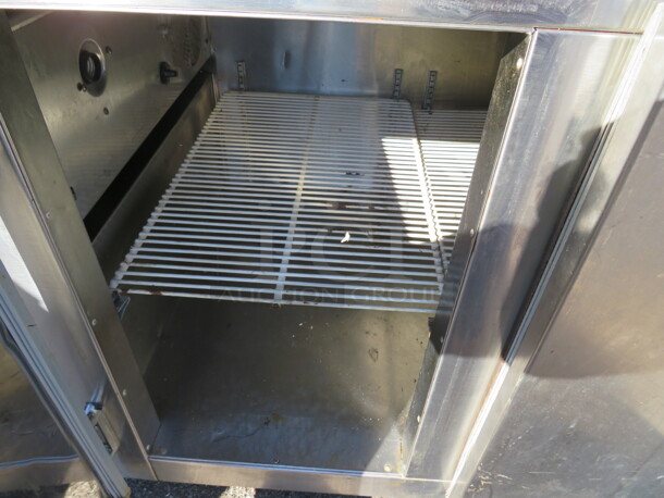 One Working 2 Door Refrigerated Prep Table With 2 Racks On Casters. 48X32X44 - Image 2 of 3