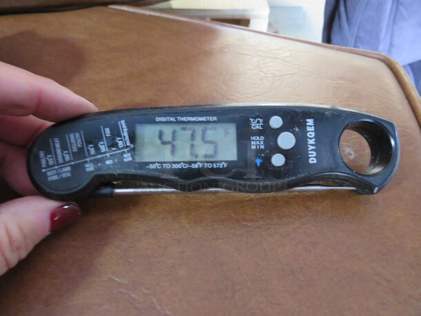One Duykgem Digital Thermometer. 